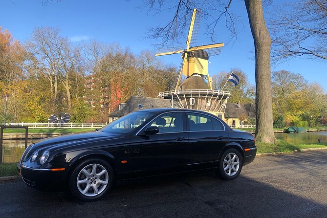 Giethoorn Private Tour Guide Giethoorn in luxury Jaguar S Type - Arriving in style: Jaguar pickup and door-to-door convenience
