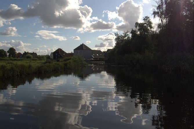Guided Canoe Adventure with Picnic Lunch in Waterland from Amsterdam - Canoeing in Waterland: reedbeds, birdsong, and those low bridges