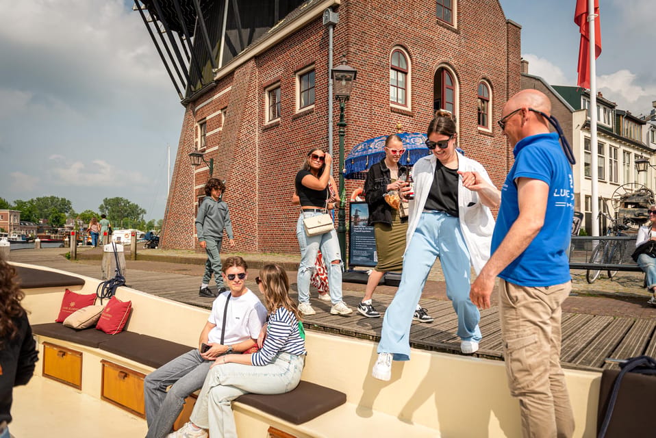 Haarlem: De Adriaan Windmill Tour + Open Canal Cruise - Stops along the canals: what to look for on each stretch
