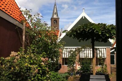 Half-Day Edam and Volendam Private Walking Tour from Amsterdam - Cheese Museum, Church Views, and the Weights-to-World Connection