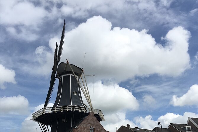 Holland Four City Charm Tour - Private Day Tour - Delft: Cobblestones, Canals, and the Burial Link to William of Orange