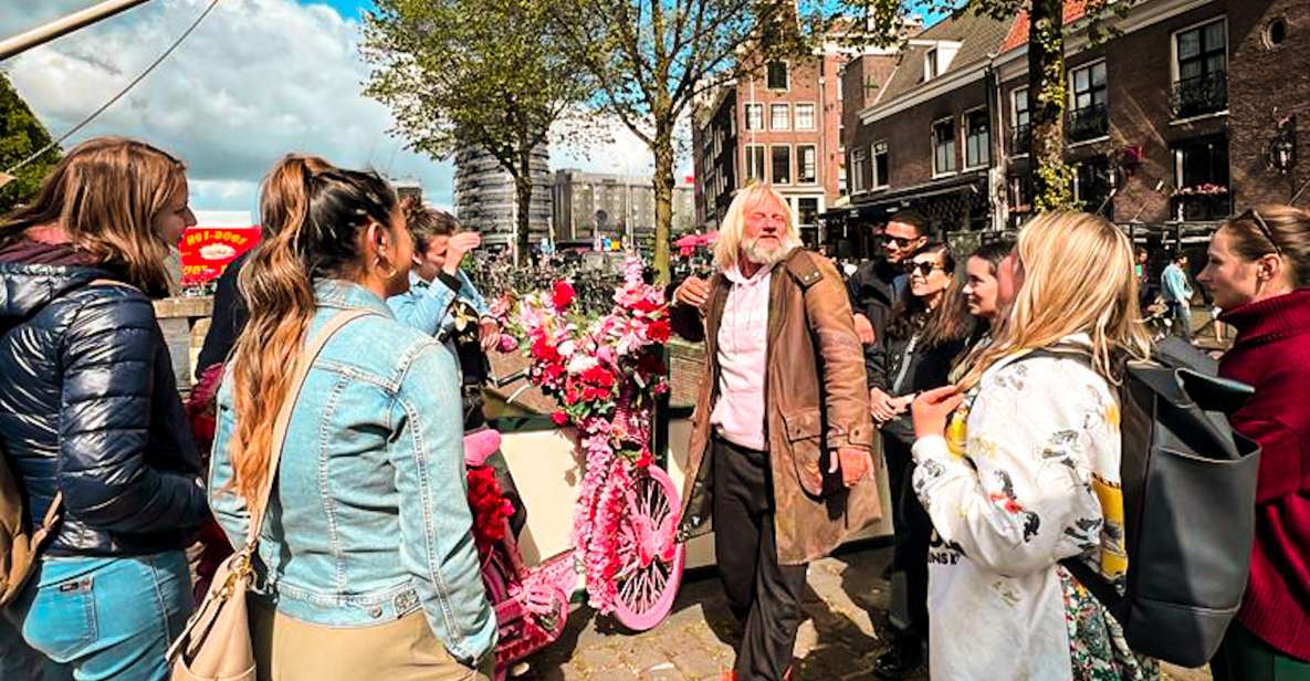 Humans of Amsterdam - Small group cultural walking tour - Standing at Homomonument, right where the story starts