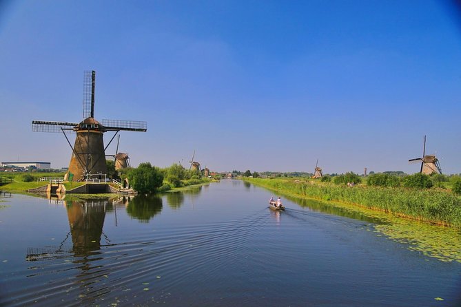 Kinderdijk private tour WINDMILLS in luxury Jaguar S Type - Kaasboerderij Gein Genoegen: short, included, and designed not to overstay