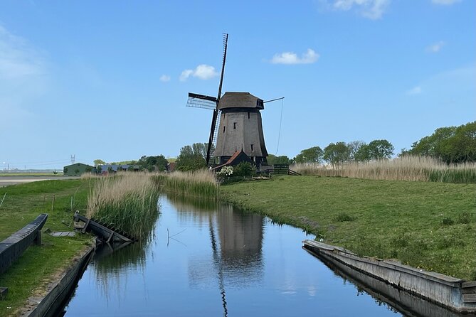 Kinderdijk Windmills, Delft City & Delft Blue Factory Visit - Delft walking tour: canals, churches, and the charm you came for