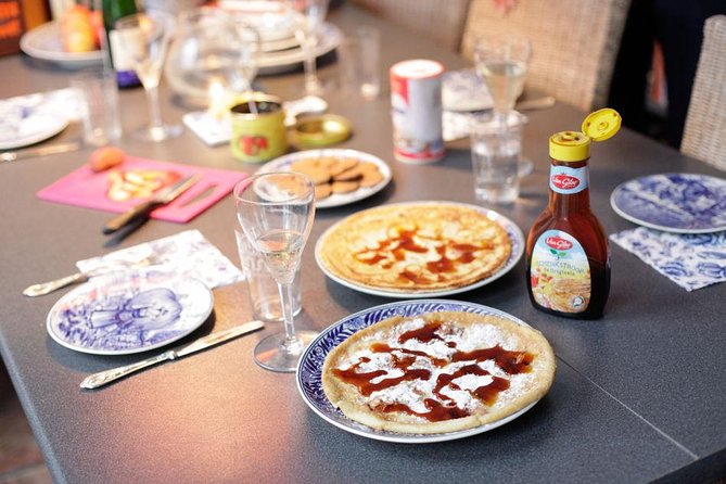 Learn to Make Dutch Pancakes in a Beautiful Amsterdam Canal House - The Amsterdam snack table: grass cheese with applesyrop and herring with pickles