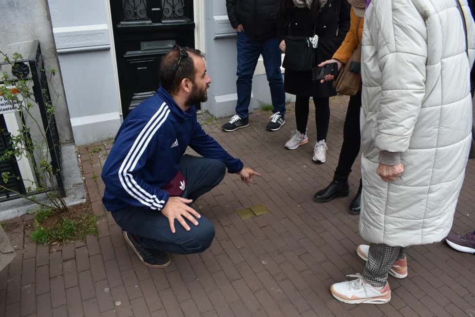 Liberal Amsterdam: Small-Group Walking Tour & Anne Frank VR - Coffee, Bottled Water, and the Polaroid-Postcard Souvenir Moment