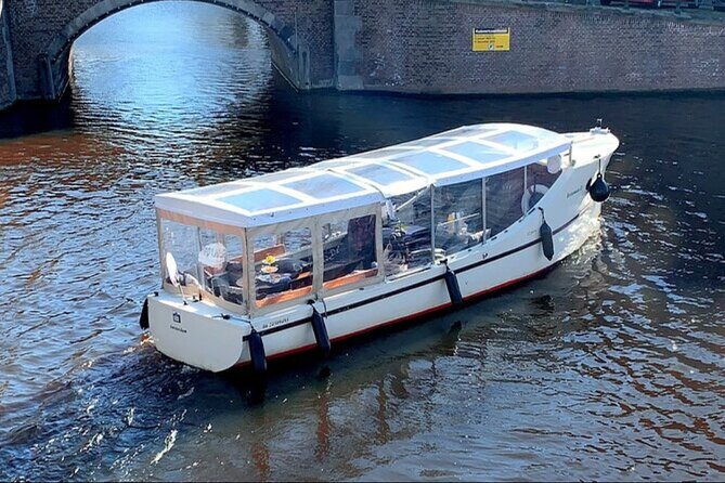Luxury Amsterdam Canal Cruise – Unlimited Cocktails Included (1H) - A 1-Hour Canal Reset from Oudezijds Voorburgwal