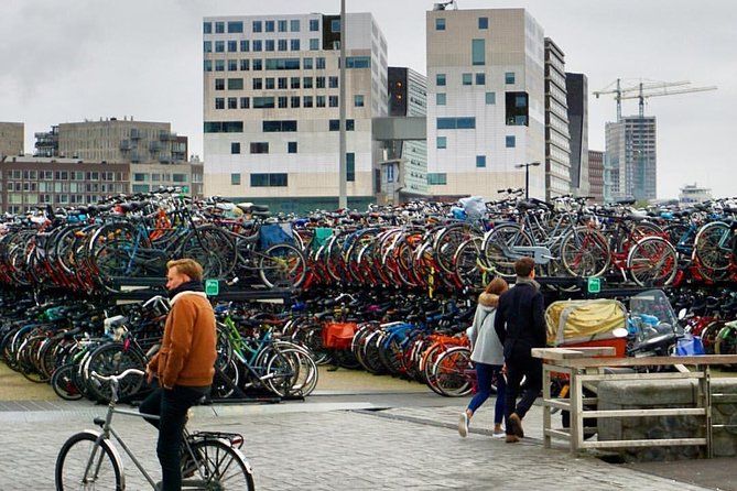 Private Amsterdam Bike Tour with a local guide (also for families) - Dam Square and Damstraat: the city’s starting point feel