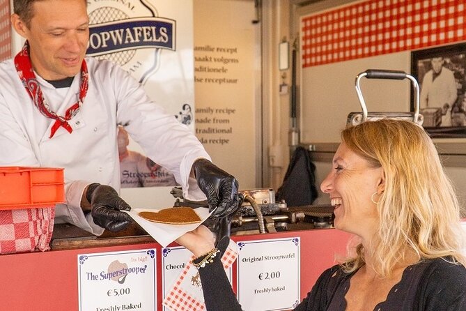 Private Amsterdam Food Tour & Dutch Pancake Class with a Local - Wine toast and the Amstel backdrop: how the experience ends