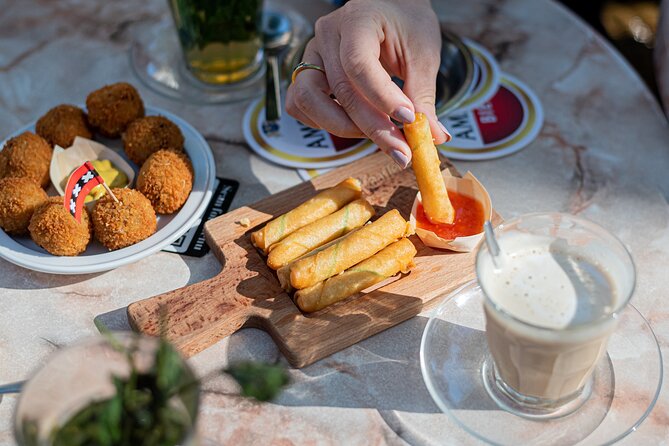 Private Amsterdam Red Light District and Food Tour (TOP RATED) - Dam Square Finish: A Natural Ending Point for Your Next Move