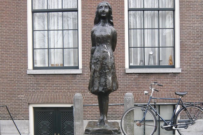 Private Amsterdam WW2 walking tour - Dam Square and the Royal Palace: the public center after catastrophe