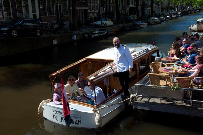 Private Champagne Canal Cruise in Amsterdam - Amstel River, Locks, and the Amstel Hotel Area: Where the Water Runs the City