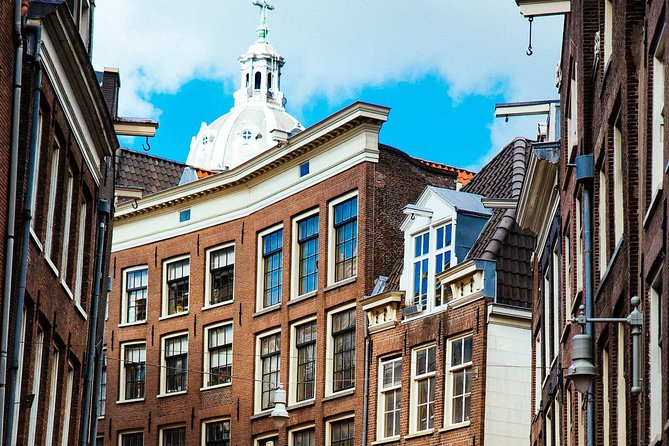 Private City Kickstart Tour: Amsterdam - Bloemenmarkt Air to Begijnhof Chapels: Flowers, Contrast, and a Moment of Quiet