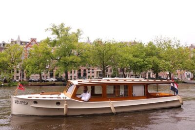 Private Guided Historic Amsterdam Canal Cruise in a Salon Boat - Central Station, the East Indiaman, and Maritime Views From Water