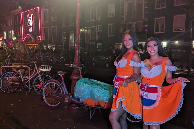 Private Hostess Bar Tour in Amsterdam Red Light District (3h) - De Wallen in about 90 minutes: four bars, free shots, and showtime