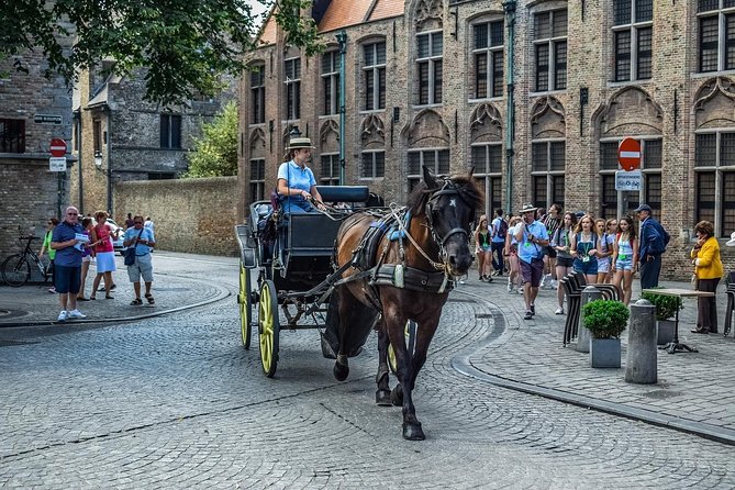 Private Sightseeing Day Trip to Ghent and Bruges from Amsterdam - Gravensteen Castle: audio comedy at a medieval stronghold