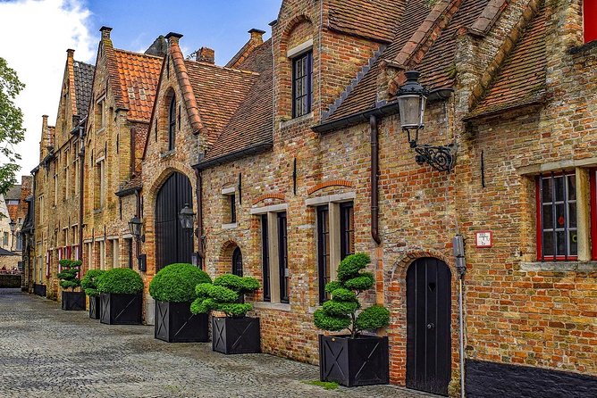 Private Sightseeing Day Trip to Ghent and Bruges from Amsterdam - The Markt: your long lunch-and-stroll reset (about 3 hours)