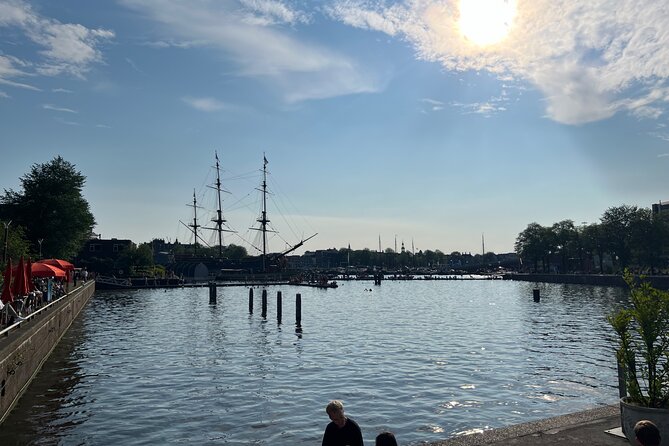Private Walking Tour of Amsterdam - The central square’s beating-heart energy: power, belief, and memory