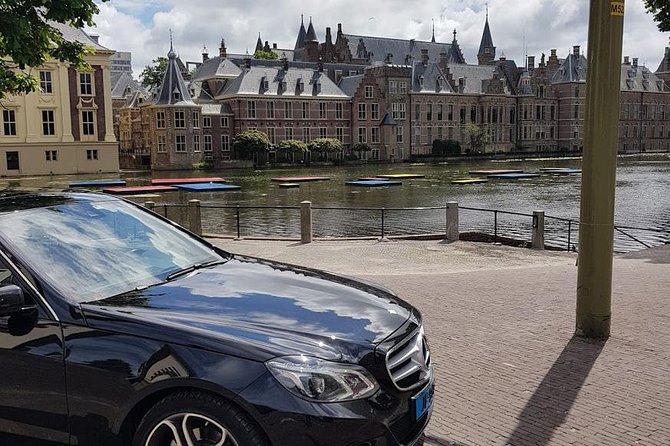 privatetour Delft, The Hague&Rotterdam Kinderdijk from Amsterdam - Koninginnenhoofd and Hotel New York: a quick Maas moment