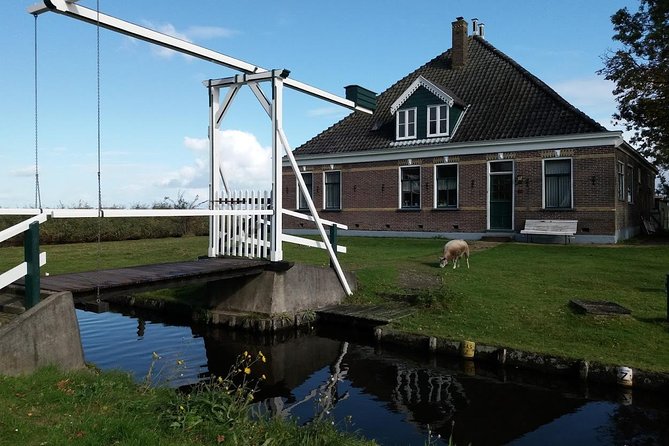 Small-Group Guided Sunset Canoe Tour in Waterland with Dinner - The Island Picnic Dinner and Windmills Over the Water