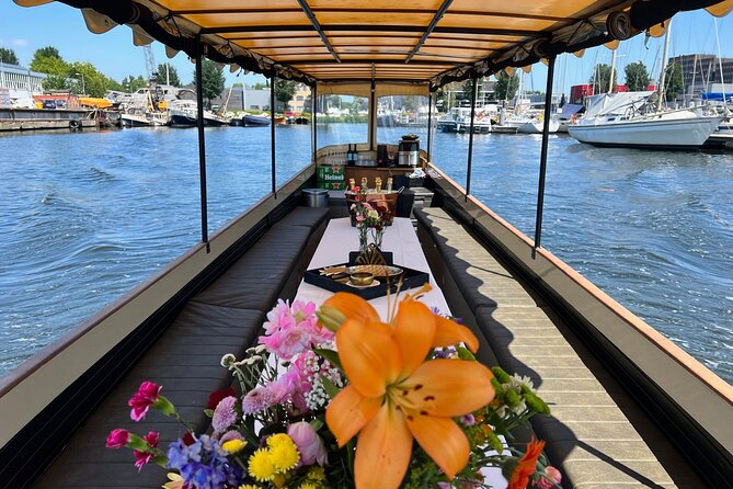Small-Group Luxury Canal Cruise with Local Skipper - Crooked canal houses near the Amstel: slow down and watch the water