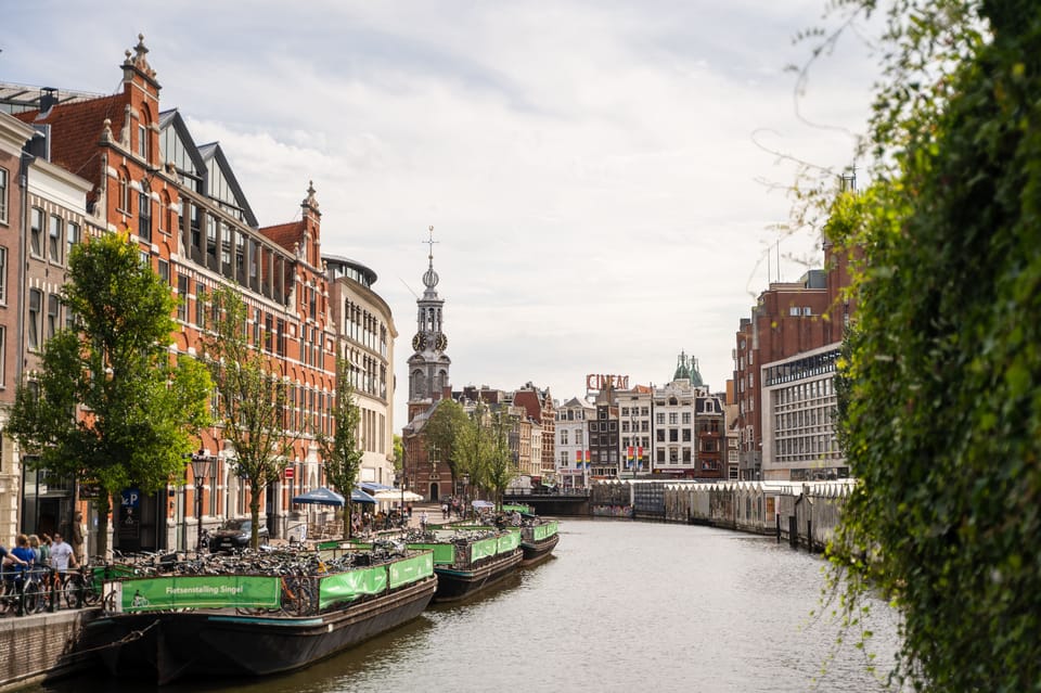 Small-Group Walking Tour with Amsterdam Canal Cruise - The Canal Cruise Setup: Tickets in Hand and Time to Transition