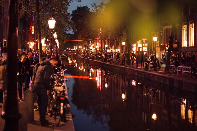 Treasures of Amsterdam: Coffeeshops & Red Light District Private Tour - Red Light District Stories: Local Attitudes and Straight Talk