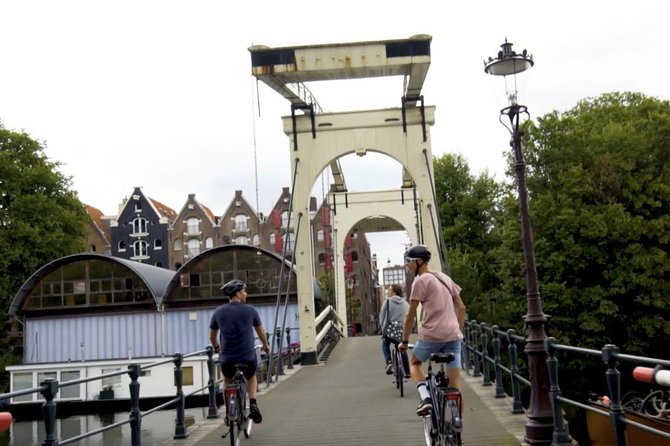 Urban Adventures Amsterdam Bike Tour, Graffiti and Magnet Fishing - What you’re really paying for: bike, ferries, graffiti time, and magnet fishing