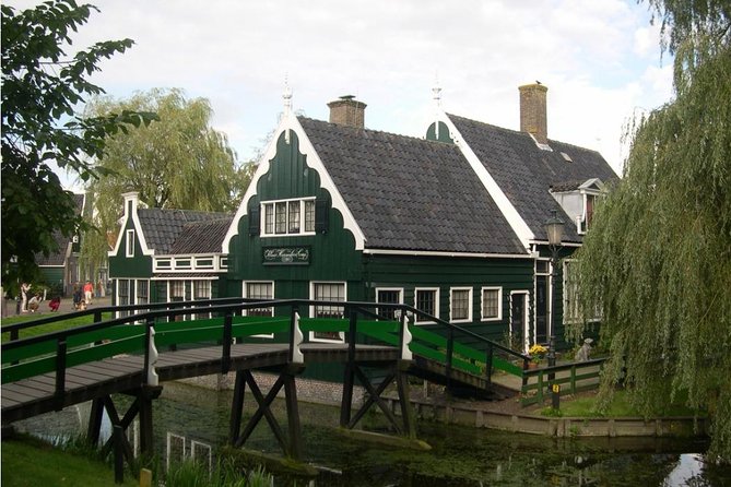 Visit Amsterdam Countryside with windmills by bike - Riding Back and Boat to Amsterdam: Ending Without the Drag