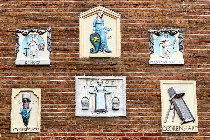 Walking Tour about Golden Age Architecture, private local guide - Prinsengracht warehouses and Jordaan facade stones: the canal belt as a work system