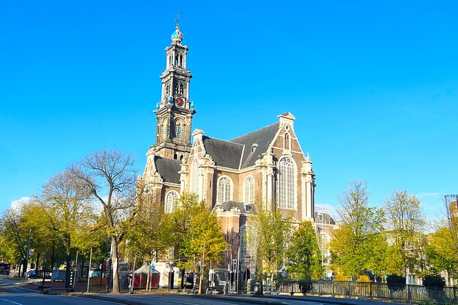 Walking Tour about Golden Age Architecture, private local guide - Westerkerk: spire math, Rembrandt’s final resting place, and clock chimes tied to Anne Frank