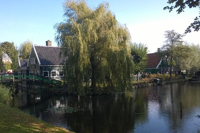 Zaanse Schans and Volendam Private Tour from Amsterdam - Jacobs Hoeve Cheese Farm by Henri Willig: Jersey Cows, Cheese Making, and Tastings