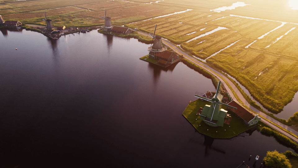 Zaanse Schans: Private Cruise + Live Guide, Optional Drinks - Cruising Past the Industrial Icons: Factories and Trade-Era Details