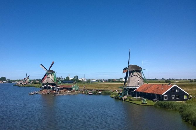 Zaanse Schans Windmills Private Tour from Amsterdam Airport - Molen De Kat: a still-working paint windmill and a real climb